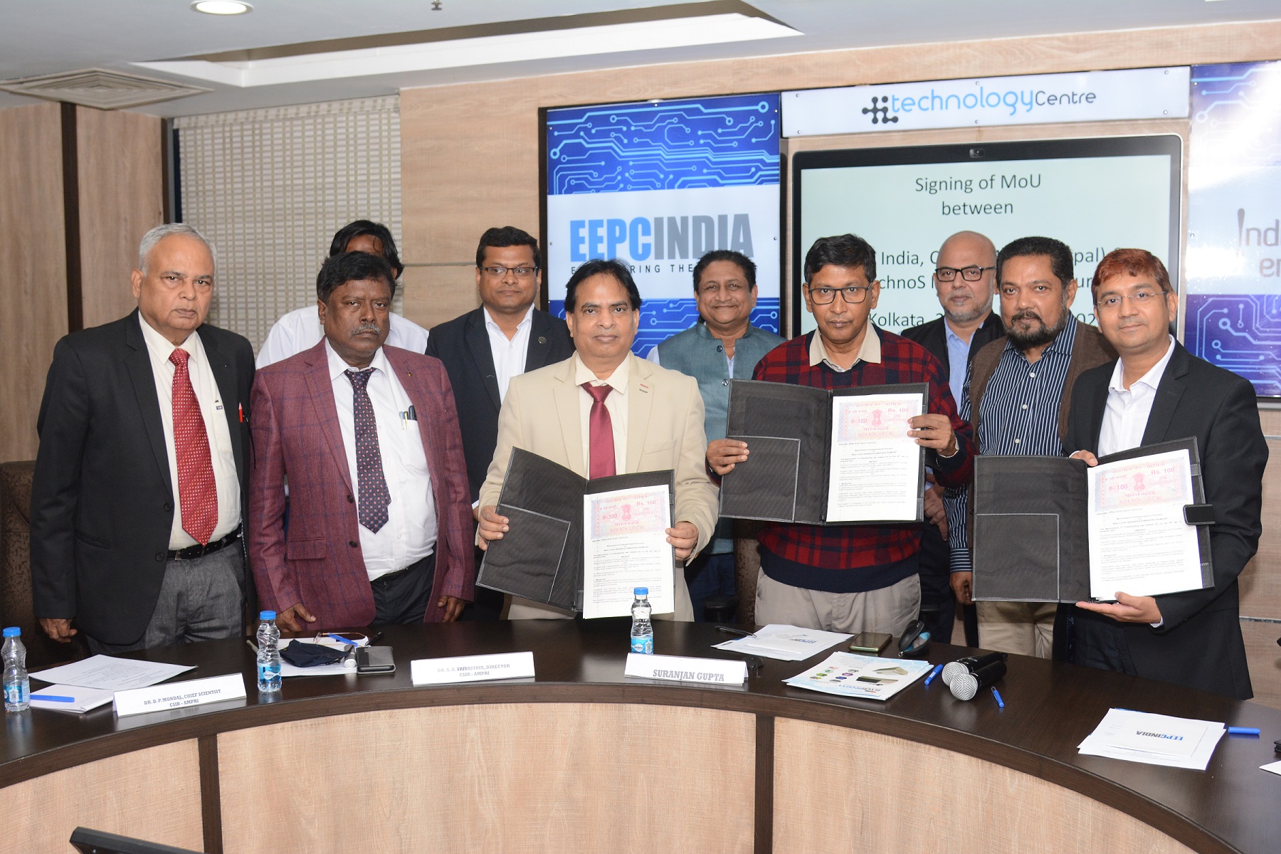 Signing MoU between EEPC India, CSIR-AMPRI, Bhopal and TechnoS Instruments, Jaipur for Promotion of INDIGENOUS RAMAN SPECTROMETER. EEPC India Executive Director, Mr Suranjan Gupta; Additional Executive Director & Secretary, Mr Adhip Mitra; Advisor, Mr Bhaskar Sarkar and Director (P & A), Mr D J Basu were present with others.