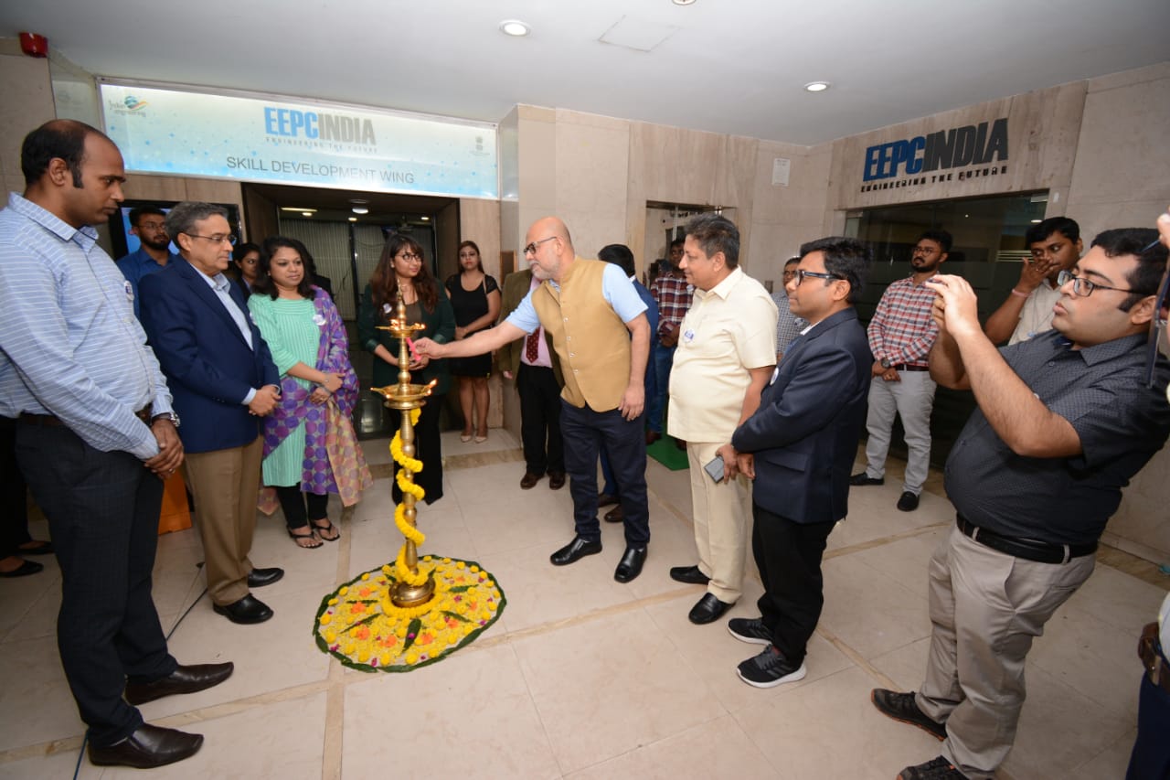  Mr Adhip Mitra, Additional Executive Director and Secretary, EEPC India lighting the lamp. Dignitaries were present - Dr. Arun Pradhan, Assistant Controller, Controller General of Patents, Designs & Trade Marks, Kolkata, DPIIT, Ministry of Commerce, Government of India (far right ); Mr Arun Kumar Garodia, Chairman, EEPC India (second from left); Ms Naveli Nevatia, Convenor of Product Panel on Industrial Machinery, EEPC India & M/s. Nevatia Udyog Limited, Kolkata (third from left) and Mr D J Basu, Director (P&A) and Coordinator, EEPC India Technology Centre (second from right).