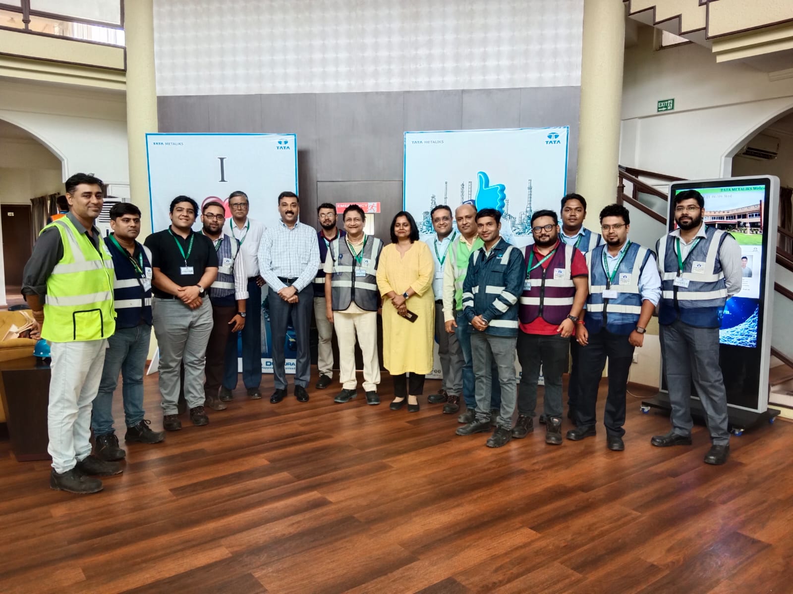 EEPC India Technology Centre organised an Industrial Visit to the Kharagpur Manufacturing Plant of Tata Metaliks (a subsidiary of Tata Steel). EEPC India Director (P & A), Mr D J Basu with EEPC India members NIPHA Group, Corona Steel Industry Pvt Ltd, NIF Ispat Ltd, Neogi Technologies & Research Pvt Ltd and Techo Enterprise paid an Industrial Visit. Mr Alok Krishna, MD  (in the middle - 7th  from left); Dr Ratna Sinha, VP (HRM) (in yellow attire); Mr Ashish Pandey, Chief Operations, DIP2 (to the right of Dr Ratna - one pax away); Mr Gaurav Saha, Operations Head (far left); Mr Lakhan Kumar, Manager Operations (next to Mr Pandey) all from Tata Metaliks team and EEPC India member copanies and their officials - Mr Ankan Adhikari, Manager, Biz Hero India Pvt Ltd (owned by NIPHA group) (next to Mr Lakhan); Mr Aditya Garodia, Director (on the right of Dr Ratna) and Mr Mohit Garodia (third from left) from Corona Steel Industry Pvt Ltd; Mr Sayan Das, Sr Engineer (2nd from right) and Mr Avishek Ghosh, Engineer (far right) from Neogi Technologies; Mr Debrata Chakraborty, Manager (QC) (right leg - hind row - behind Mr Ankan) from NIF Ispat Ltd; Mr Pulak Ghosh, Operations Manager, Nipha India (2nd from Left) and Mr Harsh Mundra, Export Executive, Nipha Exports (4th from left - next to Mr Mohit); Mr Jayanta Basu, Proprietor (6th from left) from Techo Enterprise; Mr D J Basu, Director (P&A) and Coordinator (to the left of Dr Ratna) and Mr Shibasish Sen, 3D Designer (to the left of Mr Basu - hind row) both representated EEPC India Technology Centre  are present during the photo session.