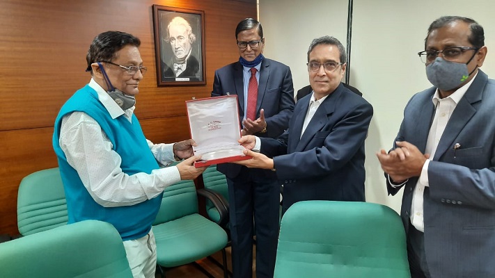 Mr Arun Kumar Garodia, Vice Chairman,EEPC India presenting memento to Dr A.S.Choudhury, Ex. Managing Director, CERATIZIT Pvt. Ltd. and Director-Technical, Camelia Group. Standing behind: Mr Jayanta Basu, Proprietor, M/s. TECHO Enterprises Ltd. And Far Right -  Mr Anupam Shah, Past Chairman and Chairman of the Committee on Technology Centre, R&D and TUFS ( Technology Upgradation Fund Scheme), EEPC India